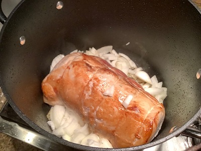 Pork browning along with onions