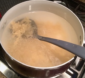 Egg noodles cooking